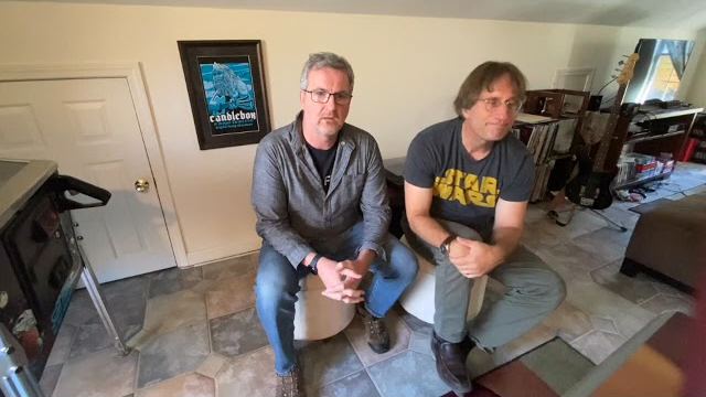 Two members of the Zephyr Sound team seated in the studio